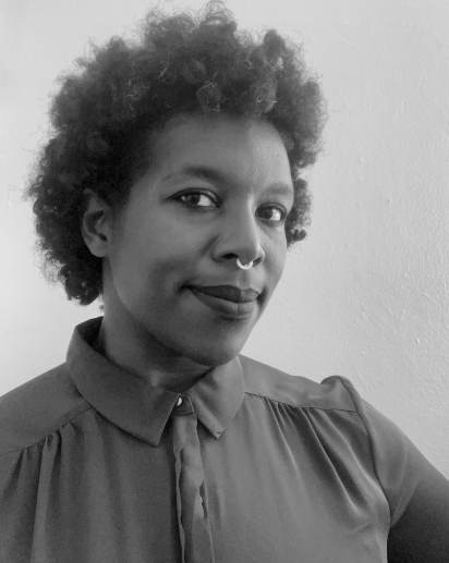 black and white photo of Brittney, Black person with curly hair